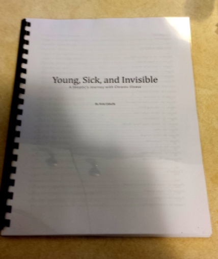 plastic bound printed copy of Young, Sick, and Invisible.