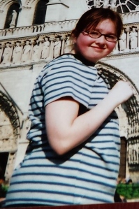Ania at 13 standing in front of the Notre Dame